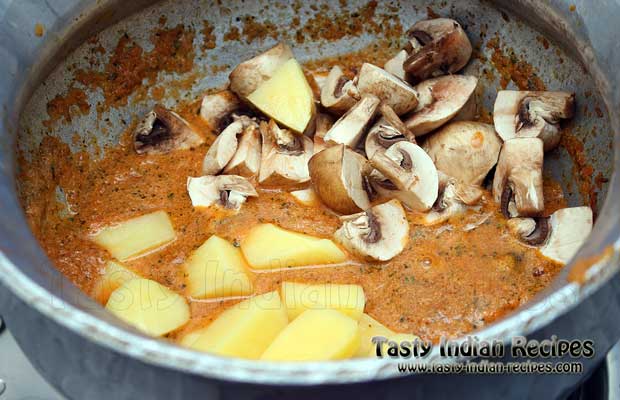 Add chopped mushrooms along with potatoes