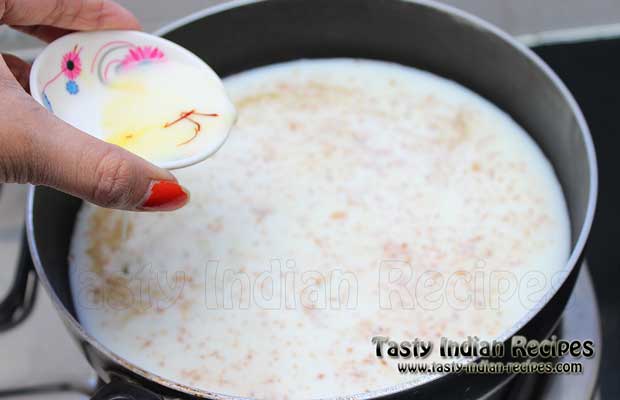 Now mix soaked saffron mixture and leave till the few boils come out Now mix soaked saffron mixture and leave till the few boils come out